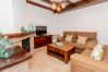 Living room with fireplace in this house in El Torcal