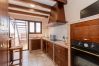 Kitchen of this house with fireplace in El Torcal