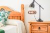 Bedroom of this house with fireplace in El Torcal