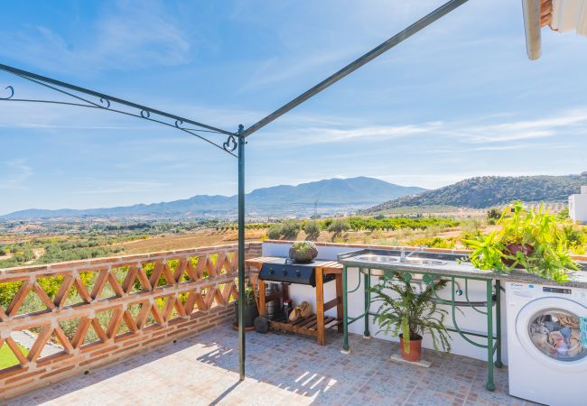 Terrace of this chalet in Coín