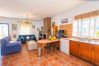 Kitchen of this house with fireplace in Coín