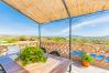 Terrace of this chalet in Coín