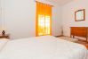 Bedroom of this house with fireplace in Coín
