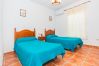 Bedroom of this house with fireplace in Coín