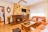 Living room with fireplace of this Finca in Alhaurín de la Torre