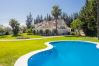 Outdoor gardens and pool of the Villa Garden